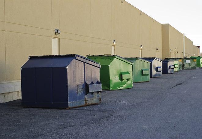 an arrangement of durable and robust disposal containers utilized on a construction project in Alton